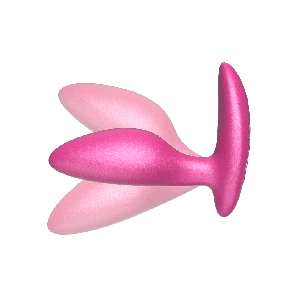 Vibrerande We-vibe Ditto+ Cosmic Pink mot vit bakgrund.