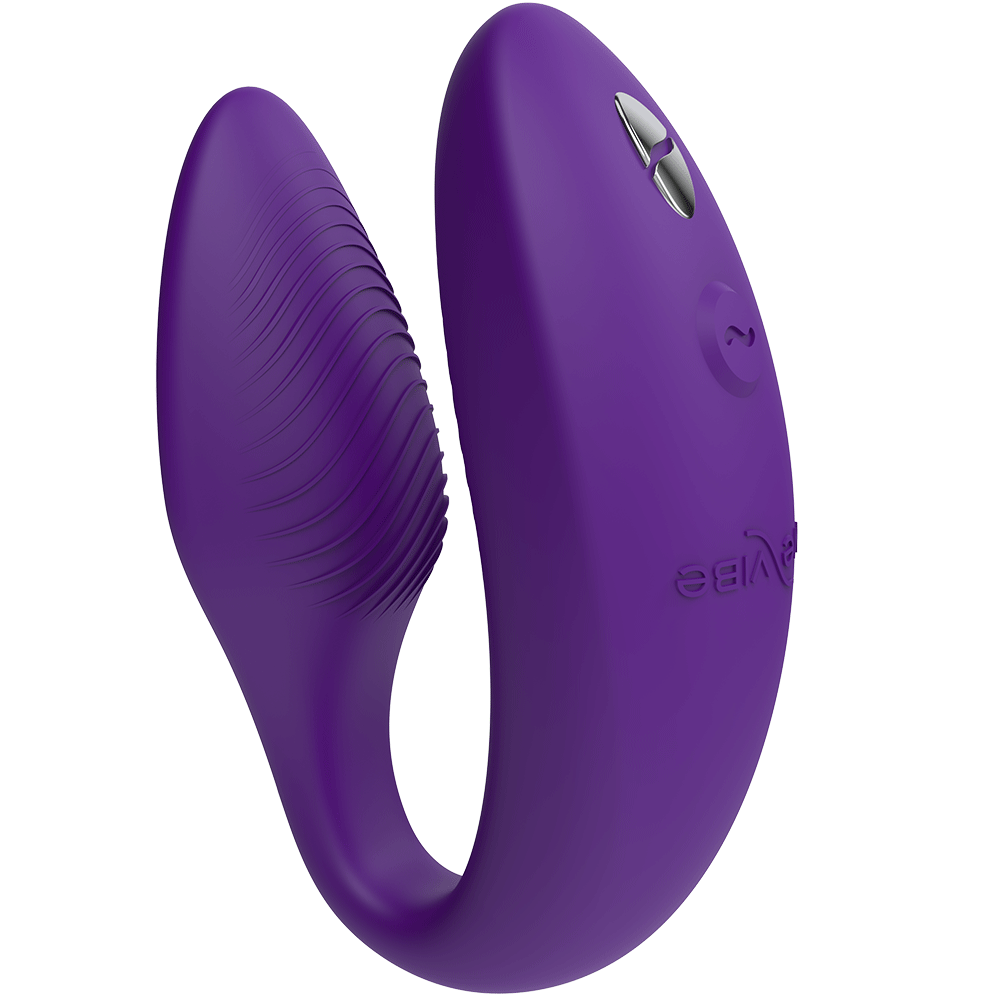 We-vibe Sync 2 Purple från sidan med räfflad yta. Lila och U-formad produkt. Vit bakgrund.