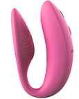 We-vibe Sync Appstyrd Parvibrator från sidan. Räfflad insida och U-form. Rosa produkt.