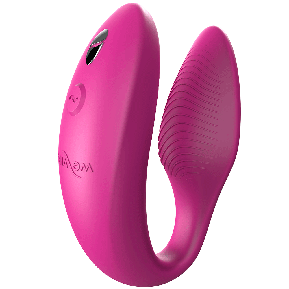 sned vinkel av rosa We-vibe Sync Appstyrd Parvibrator. Lite skuggat i U-formen.