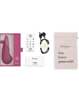 Womanizer Vibe Dusky Pink Klitorisvibrator och tillbehör.