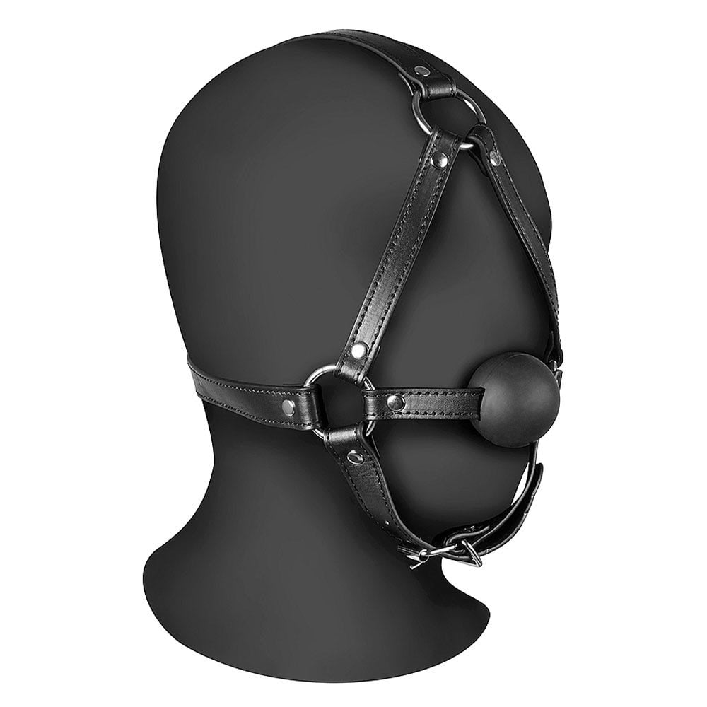 XTREME Head Harness with Solid Ball Gag på svart modellhuvud mot vit bakgrund.