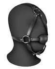 XTREME Head Harness with Solid Ball Gag på svart modellhuvud mot vit bakgrund.